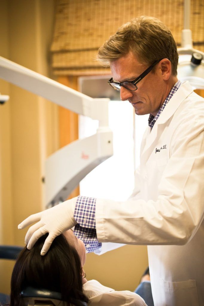 dr. haerter working with patient on cosmetic appearance